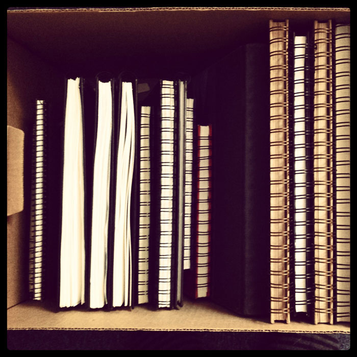 box of sketchbooks